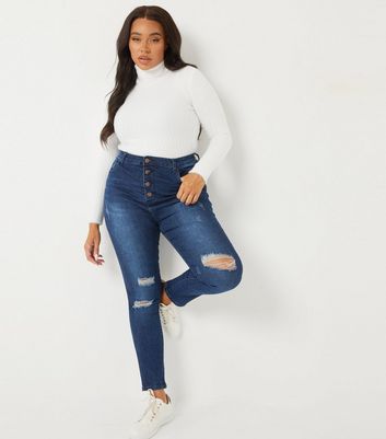 high waist ripped blue jeans