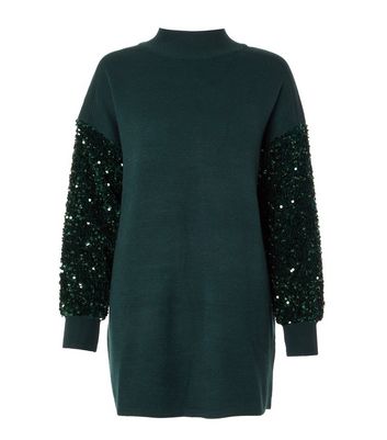 green sparkly jumper dress