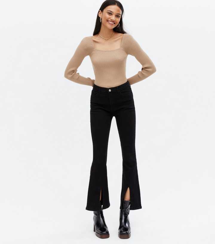 https://media3.newlookassets.com/i/newlook/809275501/womens/clothing/jeans/pink-vanilla-black-split-hem-high-waist-flared-jeans.jpg?strip=true&qlt=50&w=720