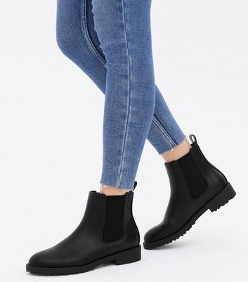 Black cleated chelsea boots on sale