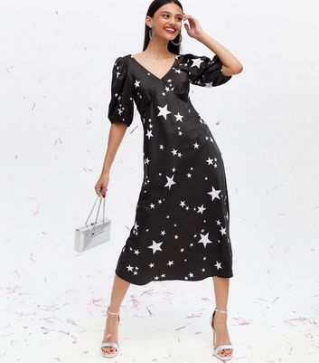 Click to view product details and reviews for Black Star Satin Midi Dress New Look.