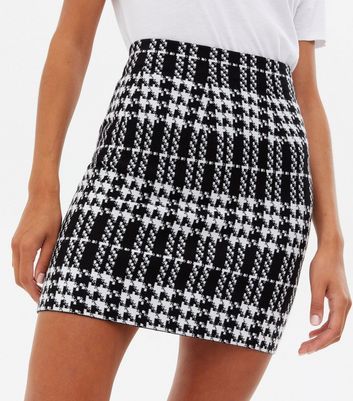 pink and black check skirt