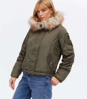 green parka with faux fur hood