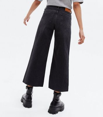 frayed hem black jeans