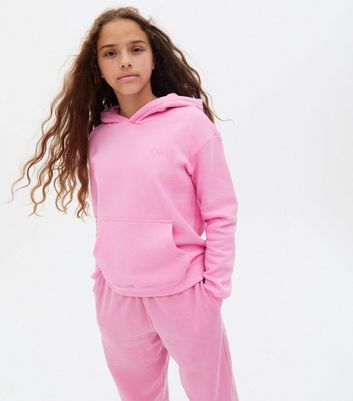 bright pink sweatsuit