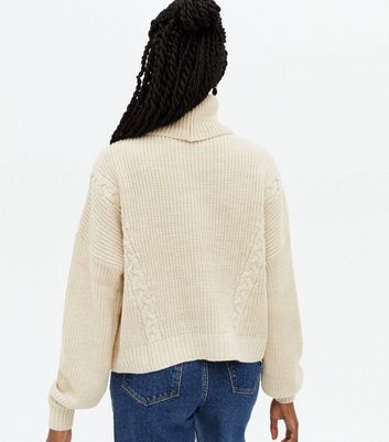 Click to view product details and reviews for Na Kd Cream Cable Knit Roll Neck Jumper New Look.