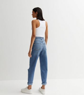 Mid blue high rise mom fit ripped on sale jeans