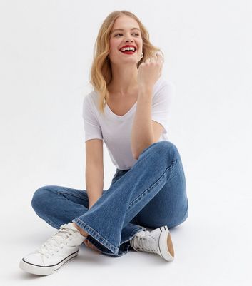 Click to view product details and reviews for Blue Mid Rise Flared Brooke Jeans New Look.