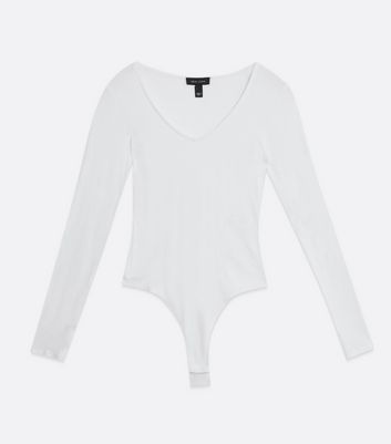 white longsleeve body suit