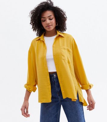 Click to view product details and reviews for Mustard Pocket Front Long Sleeve Oversized Shirt New Look.