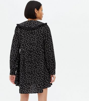 Click to view product details and reviews for Wednesdays Girl Black Star Mini Oversized Smock Dress New Look.