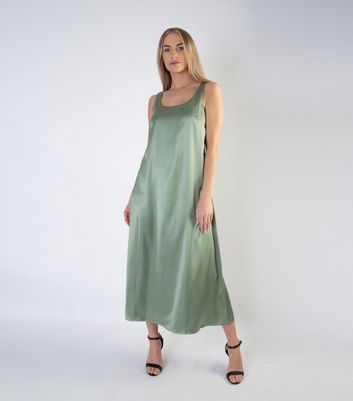 green slip maxi dress