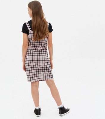 pink checkered pinafore