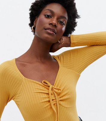 new look mustard bodysuit