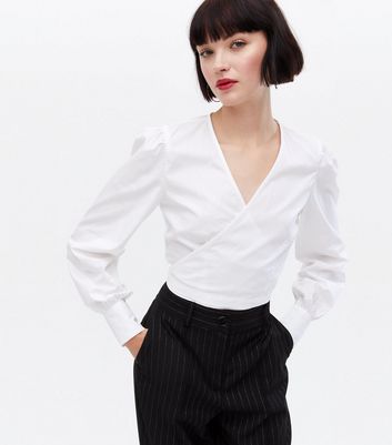 white flowy long sleeve shirt