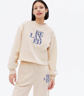 Click to view product details and reviews for Pieces Cream Relaxed Embroidered Logo Sweatshirt New Look.