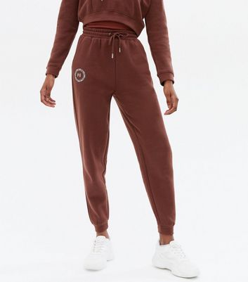 dark brown tracksuit