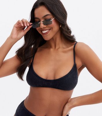 Click to view product details and reviews for Black Textured Scoop Neck Bikini Top New Look.