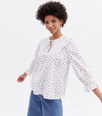 Click to view product details and reviews for White Ditsy Floral Scallop Collar Blouse New Look.