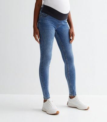 https://media3.newlookassets.com/i/newlook/813114640M2/womens/clothing/jeans/maternity-blue-under-bump-lift-shape-emilee-jeggings.jpg