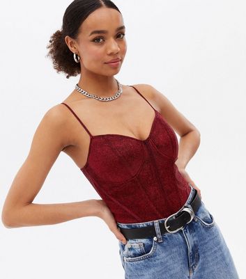 Click to view product details and reviews for Burgundy Glitter Bustier Bodysuit New Look.