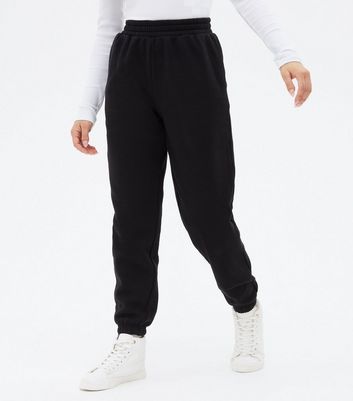 Click to view product details and reviews for Petite Black Jersey Cuffed Joggers New Look.