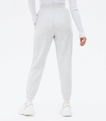Click to view product details and reviews for Petite Grey Jersey Cuffed Joggers New Look.
