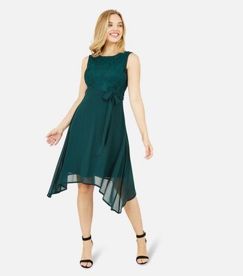 Click to view product details and reviews for Mela Green Lace Dip Hem Sleeveless Mini Dress New Look.