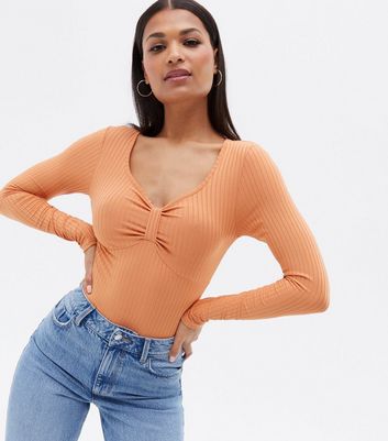 orange ribbed bodysuit