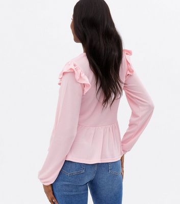 pink frilly top