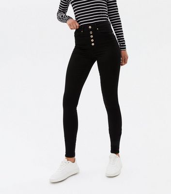 button skinny jeans