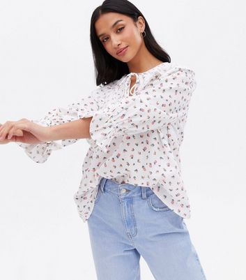 Click to view product details and reviews for Petite White Ditsy Floral Scallop Collar Blouse New Look.