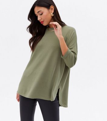 Click to view product details and reviews for Khaki Fine Knit Long Curved Hem Top New Look.