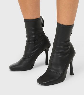 heeled leather sock boots