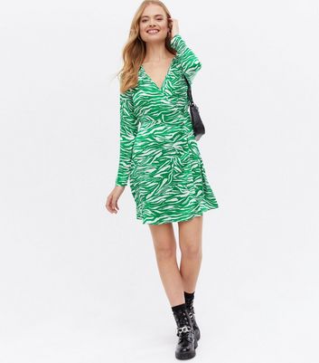 Click to view product details and reviews for Green Zebra Print V Neck Mini Wrap Dress New Look.