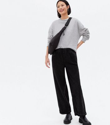 Click to view product details and reviews for Noisy May Black Relaxed Wide Leg Jeans New Look.