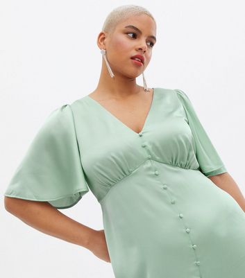 Click to view product details and reviews for Curves Light Green Satin Flutter Sleeve Button Front Midi Dress New Look.