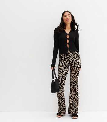 ONLY Petite Brown Zebra Print Flared Trousers