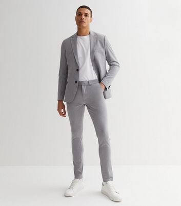 Grey super skinny fit check print trousers  River Island