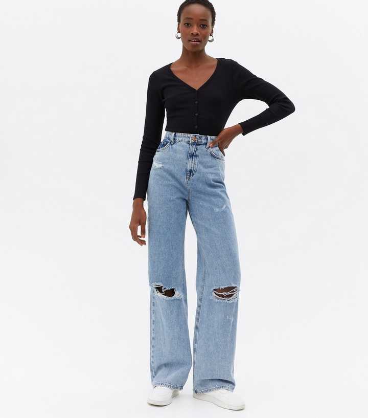 New Look Tall flared jeans in mid blue - ShopStyle