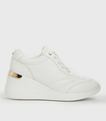 Low top store wedge sneakers