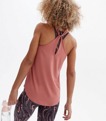 Click to view product details and reviews for 20 Reps Mid Pink Logo Twist Back Racer Sports Vest New Look.