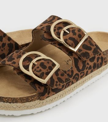 Click to view product details and reviews for Wide Fit Brown Leopard Print Buckle Footbed Sliders New Look Vegan.