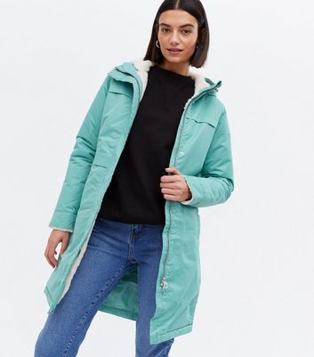 pale blue north face jacket