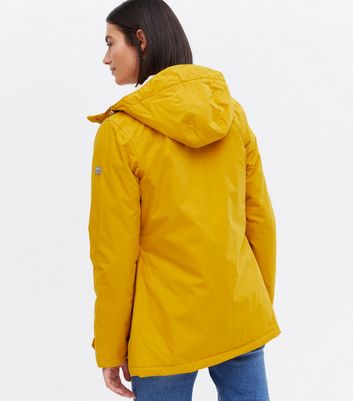 New look store yellow raincoat