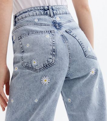 Click to view product details and reviews for Blue Daisy Embroidered High Waist Adalae Wide Leg Jeans New Look.