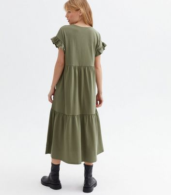 Click to view product details and reviews for Khaki Frill Sleeve Tiered Midi Smock Dress New Look. Click to view product details and reviews for Khaki Frill Sleeve Tiered Midi Smock Dress New Look.