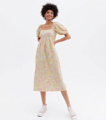 Click to view product details and reviews for Yellow Floral Shirred Square Neck Midi Smock Dress New Look.