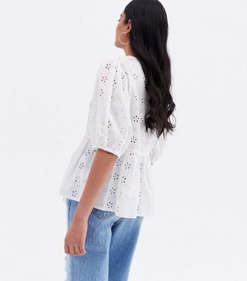 white broderie peplum top
