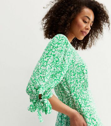 Click to view product details and reviews for Tall Green Ditsy Floral Tie Sleeve Mini Dress New Look.